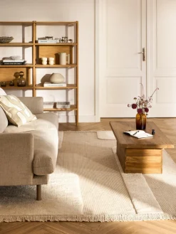 Alfombra artesanal con relieve y flecos Laine