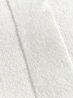 Alfombra artesanal de algodón texturizada Dania