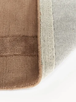 Alfombra artesanal de algodón texturizada Dania