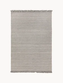 Alfombra artesanal de lana con flecos Lars