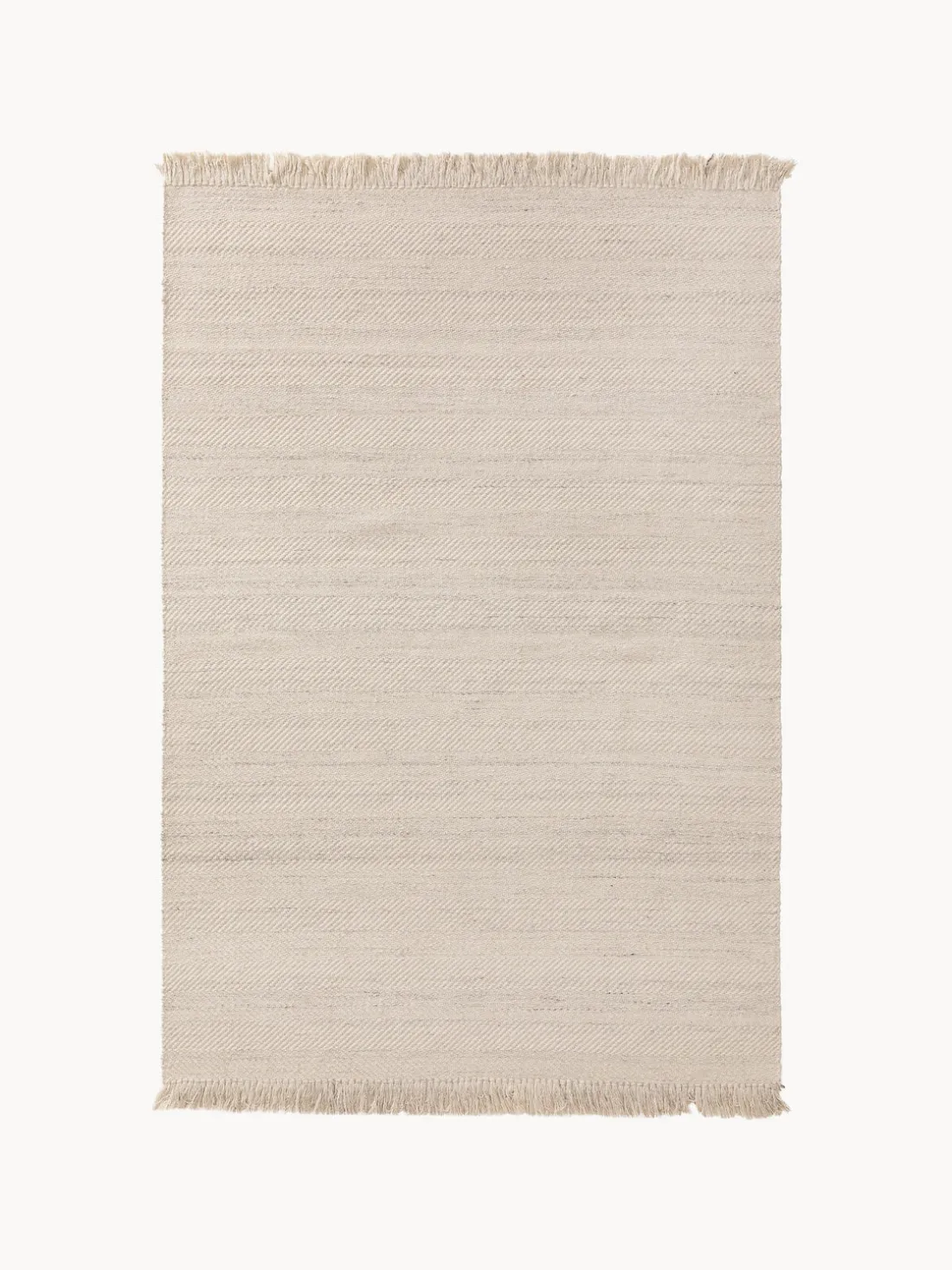 Alfombra artesanal de lana con flecos Lars