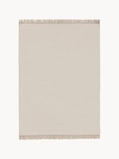 Alfombra artesanal de lana con flecos Liv