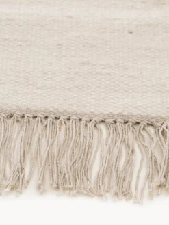 Alfombra artesanal de lana con flecos Liv