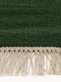 Alfombra artesanal de lana con flecos Liv