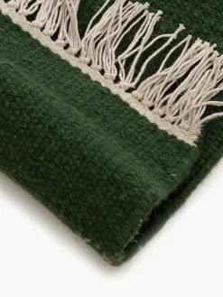 Alfombra artesanal de lana con flecos Liv