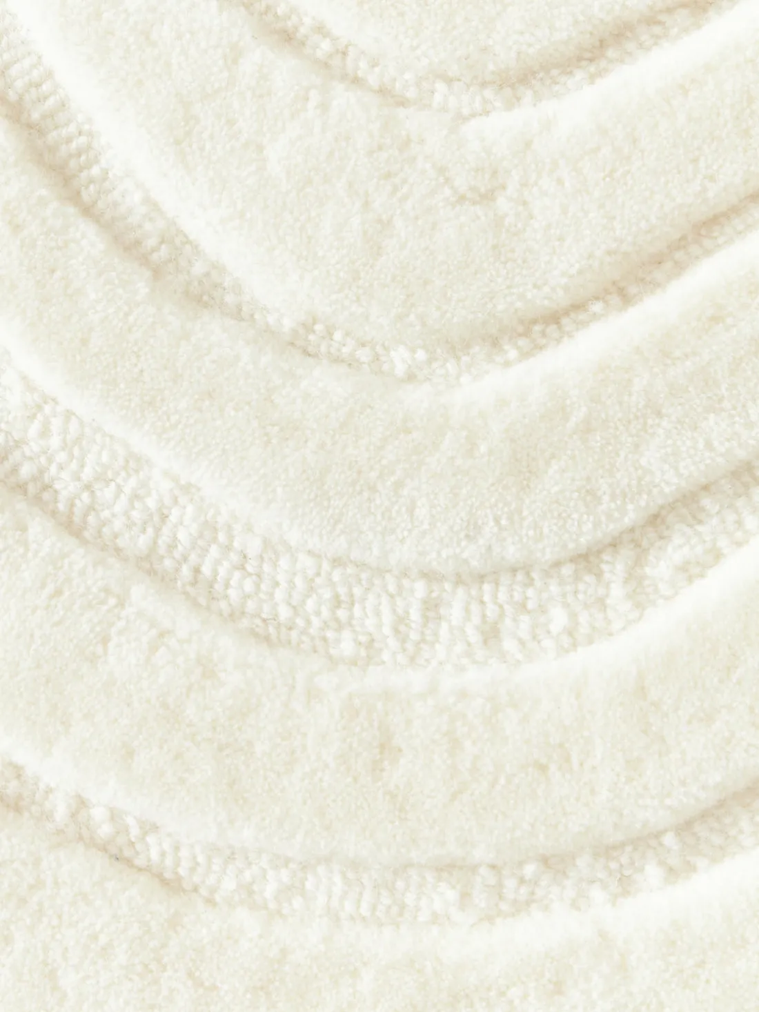 Alfombra artesanal de lana de forma orgánica Niria