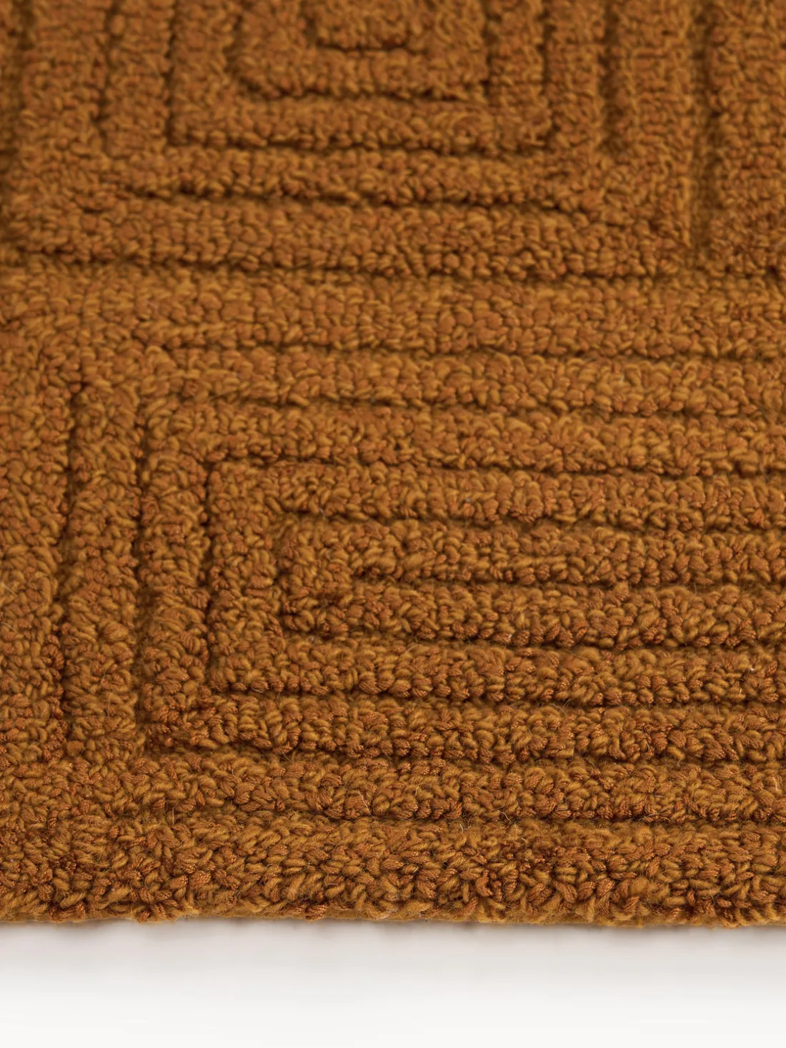 Alfombra artesanal de lana con estampado geométrico Alexia