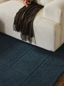 Alfombra artesanal de lana con estampado geométrico Alexia