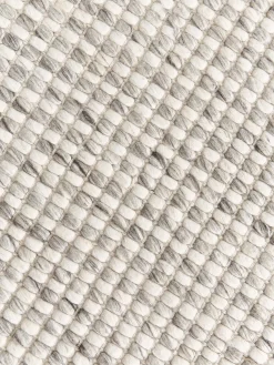 Alfombra de lana artesanal con flecos Rumi