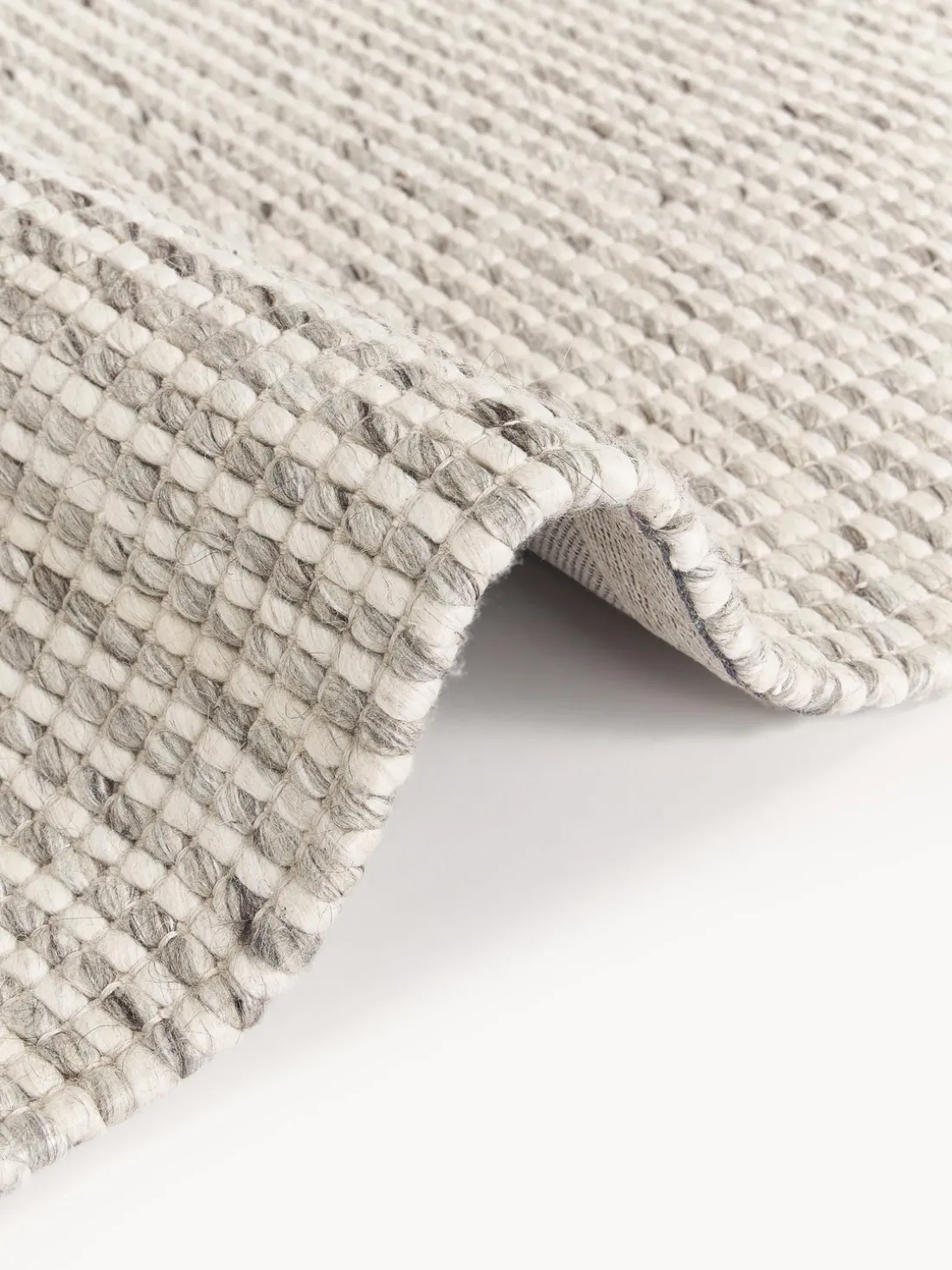 Alfombra de lana artesanal con flecos Rumi