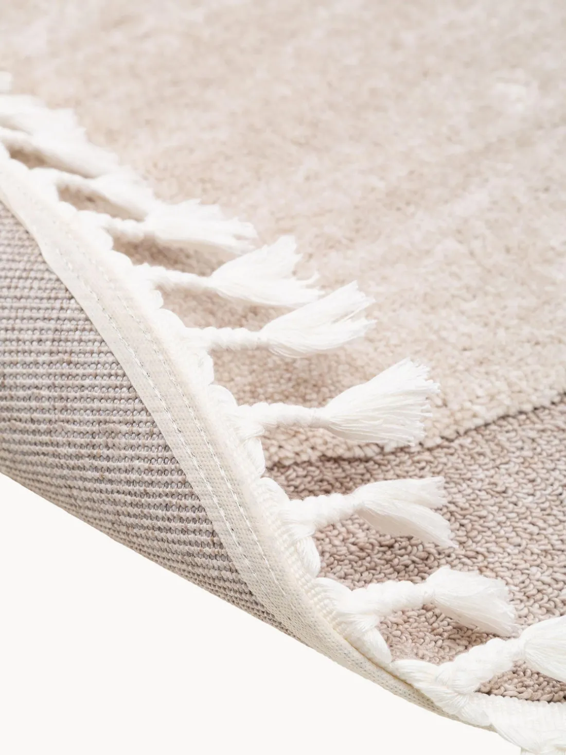 Alfombra infantil redonda texturizada con borlas Momo