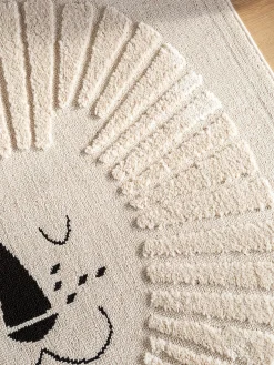 Alfombra infantil texturizada con borlas Momo