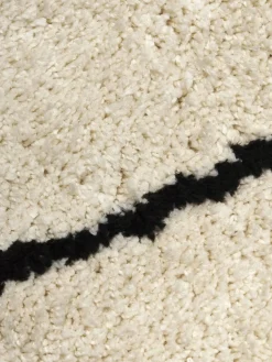 Alfombra redonda artesanal de pelo largo Naima