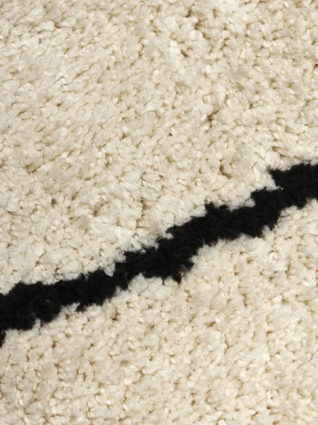 Alfombra redonda artesanal de pelo largo Naima