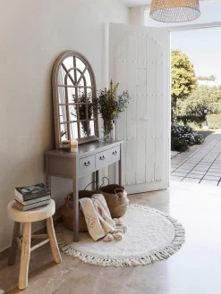 Alfombra redonda artesanal de algodón con flecos Daya