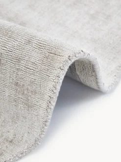 Alfombra redonda artesanal de viscosa Jane