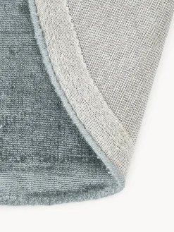 Alfombra redonda artesanal de viscosa Jane