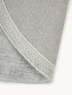 Alfombra redonda artesanal de viscosa Jane