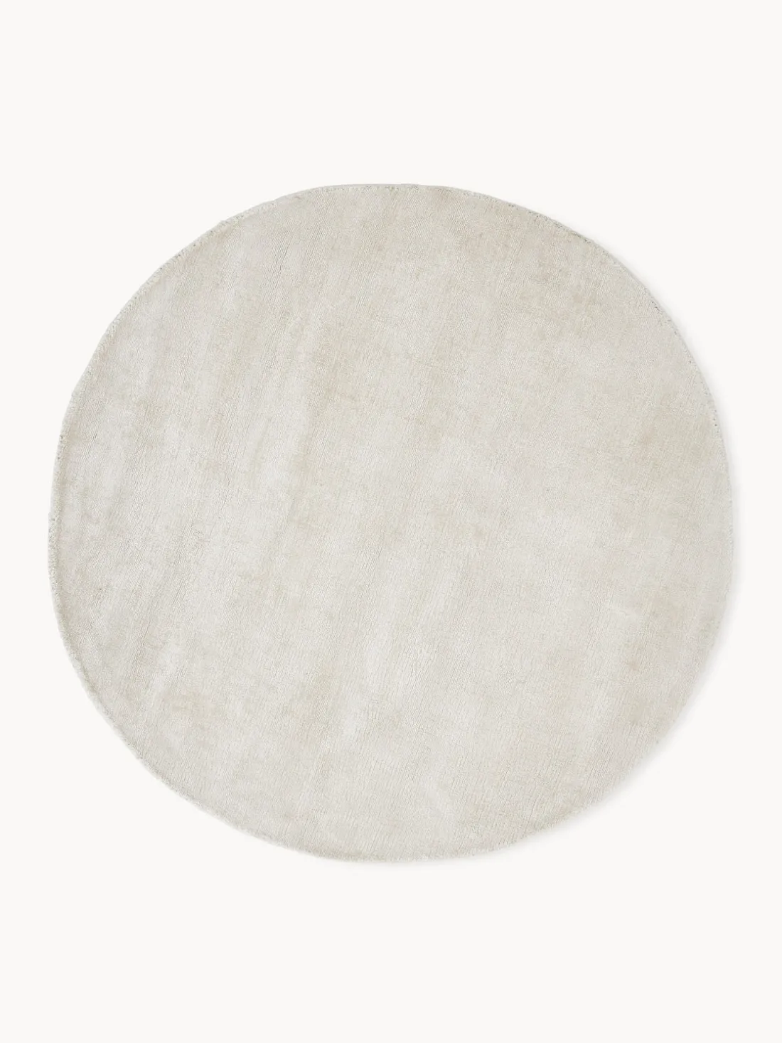 Alfombra redonda artesanal de viscosa Jane