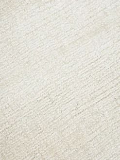 Alfombra redonda artesanal de viscosa Jane