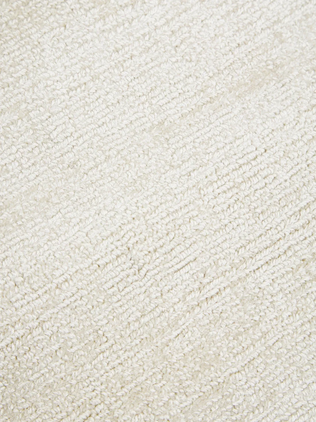 Alfombra redonda artesanal de viscosa Jane