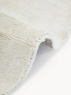 Alfombra redonda artesanal de viscosa Jane