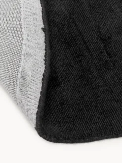 Alfombra redonda artesanal de viscosa Jane