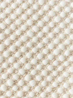 Alfombra redonda artesanal de lana Amaro