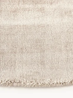 Alfombra redonda artesanal de viscosa Jane