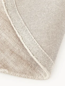 Alfombra redonda artesanal de viscosa Jane