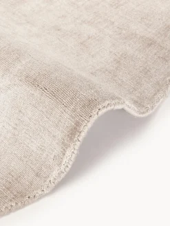 Alfombra redonda artesanal de viscosa Jane