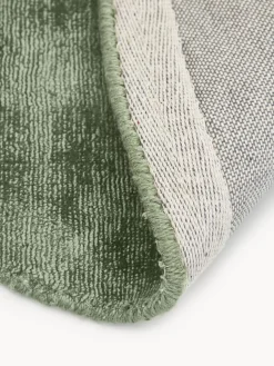 Alfombra redonda artesanal de viscosa Jane