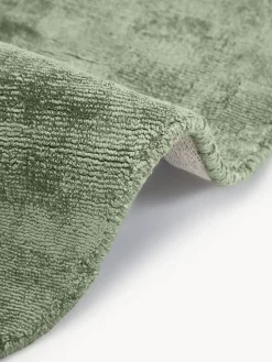 Alfombra redonda artesanal de viscosa Jane