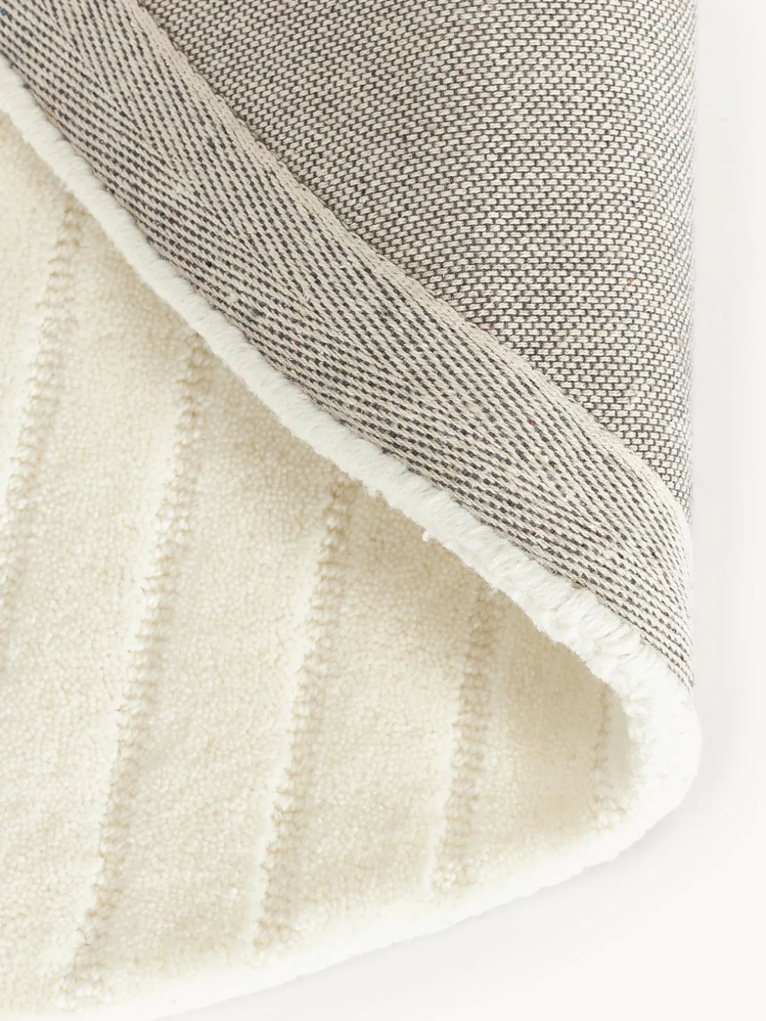 Alfombra redonda artesanal de lana Mason