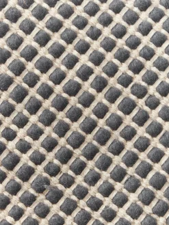 Alfombra redonda artesanal de lana Amaro