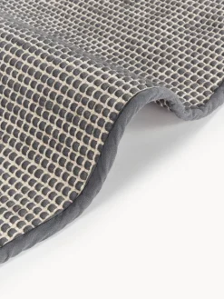 Alfombra redonda artesanal de lana Amaro