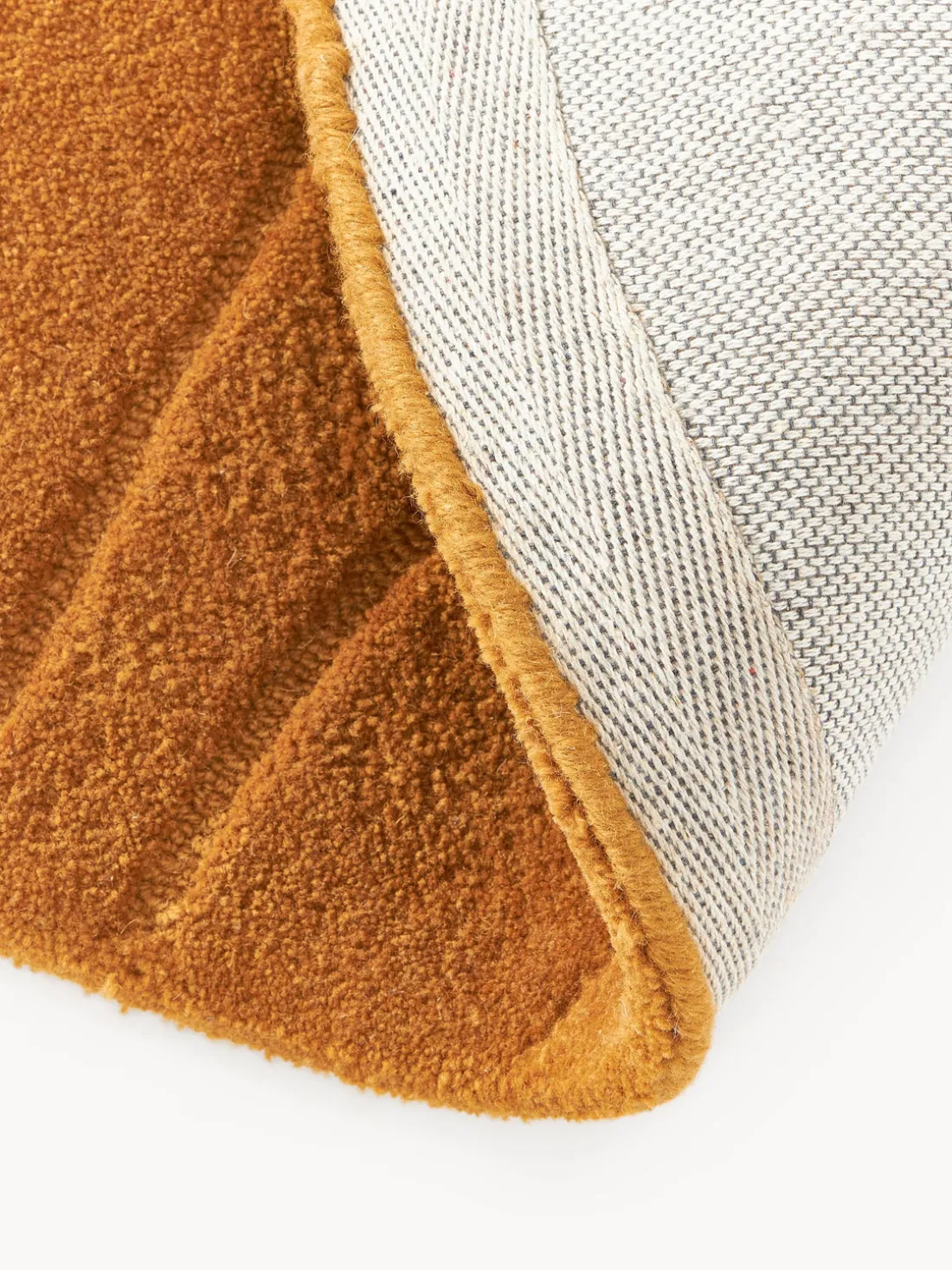 Alfombra redonda artesanal de lana Aaron