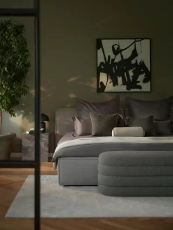 Banco tapizado en tejido bouclé Alto