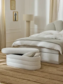 Banco tapizado en tejido bouclé con espacio de almacenaje Alto