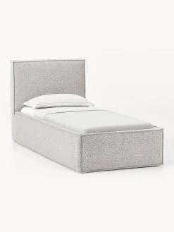 Cama individual tapizada en tejido bouclé con espacio de almacenamiento Dream