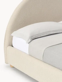 Cama tapizada en tejido bouclé Ebba, con espacio de almacenamiento