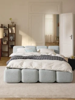 Cama tapizada en tejido bouclé Tayla