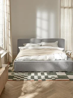 Cama tapizada en tejido bouclé con espacio de almacenamiento Lennon