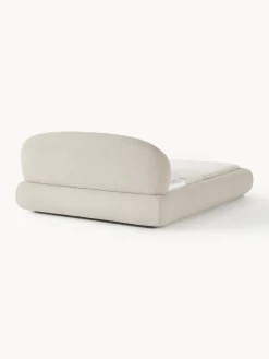 Cama tapizada redondeada en tejido bouclé Alba