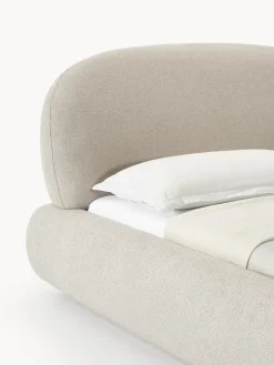 Cama tapizada redondeada en tejido bouclé Alba