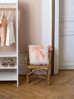 Cojín acogedor de algodón orgánico con borlas Bows