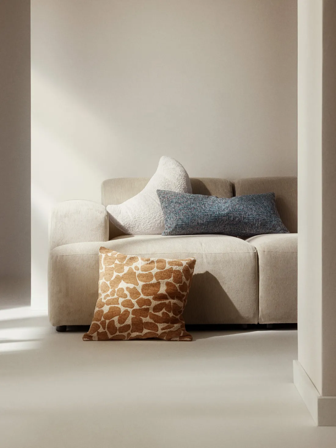 Cojín en forma de croissant en tejido bouclé Fraincois