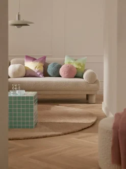 Cojín esférico de borreguillo Dotty