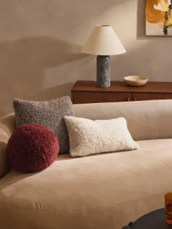 Cojín esférico de borreguillo Dotty