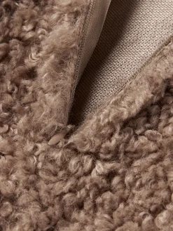 Cojín grande de borreguillo Dotty